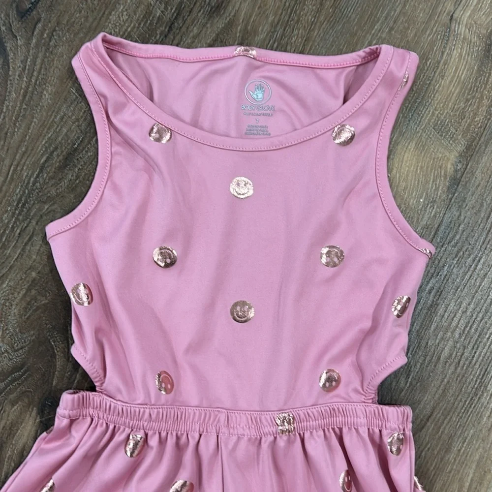Body glove romper smiley face pink with gold smiles. Size 7 Sleeveless